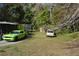 Backyard of the property with a trampoline and a vehicle at 4750 N Ronald Reagan Blvd, Sanford, FL 32771