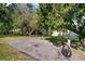 Shared grassy area with a bench and water spigot at 525 Conway Rd # 167, Orlando, FL 32807