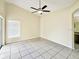 Bright dining area with tile flooring and a ceiling fan at 55 Vanna Ct, Orlando, FL 32807