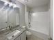 Clean bathroom with granite vanity and a shower/tub combo at 7 Bolton Ct, Kissimmee, FL 34758