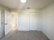 Bedroom with carpeted floors and neutral wall colors at 7 Bolton Ct, Kissimmee, FL 34758