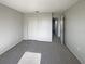 Simple bedroom with carpeted floor and neutral walls at 7 Bolton Ct, Kissimmee, FL 34758