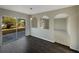 Dining area with sliding glass doors to backyard and view of living room at 7 Bolton Ct, Kissimmee, FL 34758
