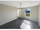 Bright dining room with hardwood floors and view of entryway at 7 Bolton Ct, Kissimmee, FL 34758