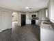 Modern kitchen with stainless steel appliances and granite countertops at 7 Bolton Ct, Kissimmee, FL 34758