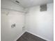 Laundry room with washer and dryer hookups and shelving at 7 Bolton Ct, Kissimmee, FL 34758
