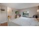 Bedroom with a large bed and en-suite bathroom at 7022 Talbot Dr, Orlando, FL 32819