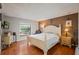 Main bedroom with a large bed and access to a private bathroom at 7022 Talbot Dr, Orlando, FL 32819