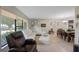 Open living and dining area with comfortable seating at 7022 Talbot Dr, Orlando, FL 32819