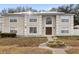 Two-story house with solar panels and landscaping at 800 Daybreak Dr, Fruitland Park, FL 34731