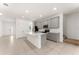 Modern kitchen with gray cabinets and breakfast bar at 8013 Basilica Ln, Winter Garden, FL 34787