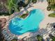 Relaxing kidney-shaped pool with surrounding patio at 822 Grand Regency Pointe # 201, Altamonte Springs, FL 32714