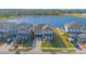 An aerial view of homes with solar panels in a residential neighborhood at 840 Livestock Loop, St Cloud, FL 34771