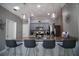 Modern kitchen with granite countertops and stainless steel appliances at 881 Orchid Grove Blvd, Davenport, FL 33837