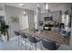 Modern kitchen with granite countertops and stainless steel appliances at 881 Orchid Grove Blvd, Davenport, FL 33837