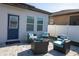 Relaxing patio with seating area, perfect for outdoor entertaining at 881 Orchid Grove Blvd, Davenport, FL 33837