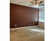 Spacious bedroom with a ceiling fan and neutral walls at 146 Prairie Falcon Dr, Groveland, FL 34736