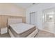 Spacious bedroom with light walls and walk-in closet at 12233 Satire St, Orlando, FL 32832