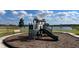 Playground with playset and slide near lake at 1507 Isleta Loop, Kissimmee, FL 34741