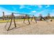 Community playground with swings and playset at 1511 Isleta Loop, Kissimmee, FL 34741