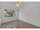 Well-lit bedroom with large window and ceiling fan at 224 Ashwood Dr, Maitland, FL 32751