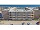 Aerial view of beachfront building with parking at 4155 S Atlantic Ave # 210, New Smyrna Beach, FL 32169