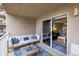 Relaxing balcony with patio furniture and ocean view at 4155 S Atlantic Ave # 210, New Smyrna Beach, FL 32169