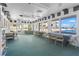 Bright community room with ocean views and tables for gatherings at 4155 S Atlantic Ave # 210, New Smyrna Beach, FL 32169