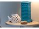 Coastal decor on side table with lamp at 4155 S Atlantic Ave # 210, New Smyrna Beach, FL 32169