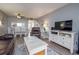 Comfortable living room with TV and seating area at 4155 S Atlantic Ave # 210, New Smyrna Beach, FL 32169