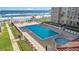 Oceanfront pool and hot tub with lounge chairs at 4155 S Atlantic Ave # 210, New Smyrna Beach, FL 32169
