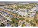Aerial view of houses and a golf course at 422 Troon Cir, Davenport, FL 33897