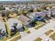 Aerial view of houses and street in a residential neighborhood at 422 Troon Cir, Davenport, FL 33897