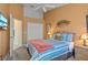 Cozy bedroom with a queen-size bed and built-in closet at 422 Troon Cir, Davenport, FL 33897