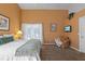 Spacious bedroom with a king-size bed and access to a private patio at 422 Troon Cir, Davenport, FL 33897