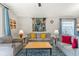 Living room with gray sofas and a blue patterned rug at 422 Troon Cir, Davenport, FL 33897