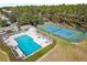 Aerial view of community pool and tennis court at 422 Troon Cir, Davenport, FL 33897