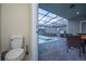 Convenient half bathroom near patio and pool at 4322 Lana Ave, Davenport, FL 33897