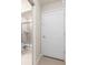 Bathroom with shower and white door to another room at 4322 Lana Ave, Davenport, FL 33897