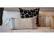 Close up of pillows on a bed with black and white patterned pillow at 4322 Lana Ave, Davenport, FL 33897
