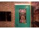 Door to Honeydukes with brick wall at 4322 Lana Ave, Davenport, FL 33897