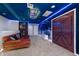 Star Wars themed game room with couch and mural at 4322 Lana Ave, Davenport, FL 33897