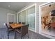 Outdoor patio with dining furniture and access to pool area at 4322 Lana Ave, Davenport, FL 33897