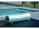 Poolside lounger with striped towel at 4322 Lana Ave, Davenport, FL 33897