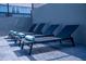 Four comfortable loungers by the pool at 4322 Lana Ave, Davenport, FL 33897