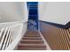 Stylish staircase with unique wall design and LED lighting at 4322 Lana Ave, Davenport, FL 33897