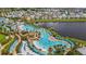 Resort aerial view showcasing pools, community, and lake at 8035 Surf St, Kissimmee, FL 34747