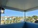 Covered balcony offering scenic views of the neighborhood at 8035 Surf St, Kissimmee, FL 34747