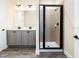 Modern bathroom with double vanity and walk-in shower at 8035 Surf St, Kissimmee, FL 34747