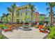 Relaxing fire pit area with colorful Adirondack chairs at 8035 Surf St, Kissimmee, FL 34747